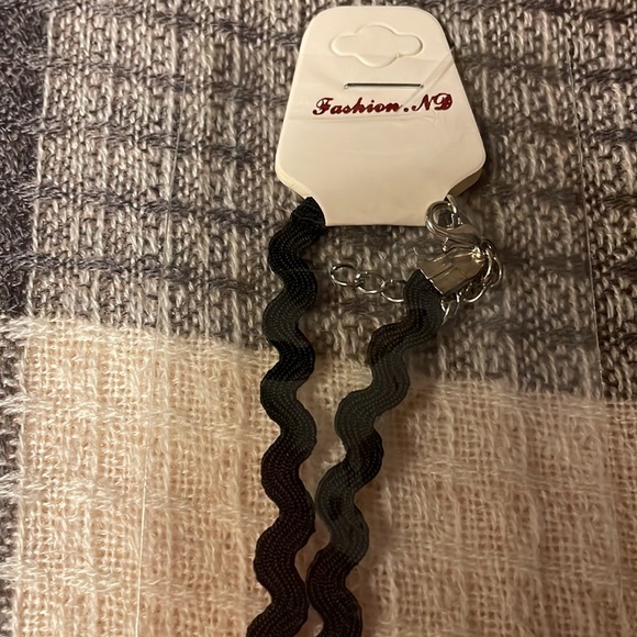 Black colored corded ribbon shaped with jewel pendant. New in package - Picture 3 of 5